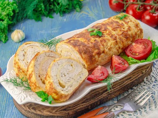 Фото готового блюда: Кабачковый рулет с фаршем в духовке