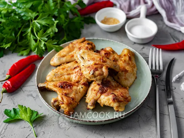 Фото готового блюда: Куриные крылья с хрустящей корочкой в духовке