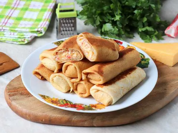Фото блюда: Блины с крабовыми палочками и сыром (в начинке)