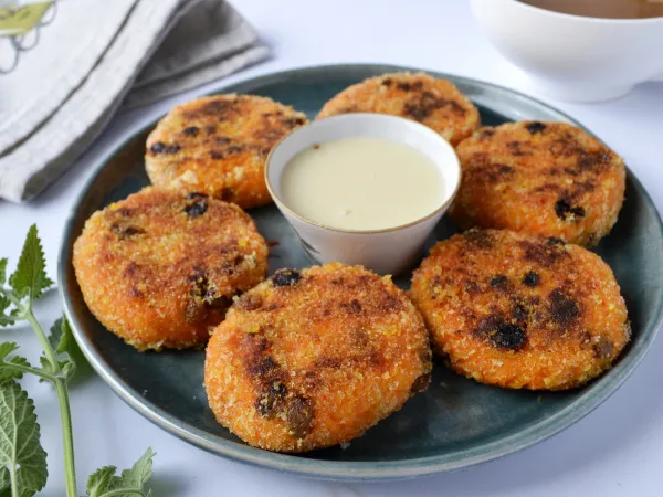 Фото блюда: Сладкие морковные котлеты с изюмом