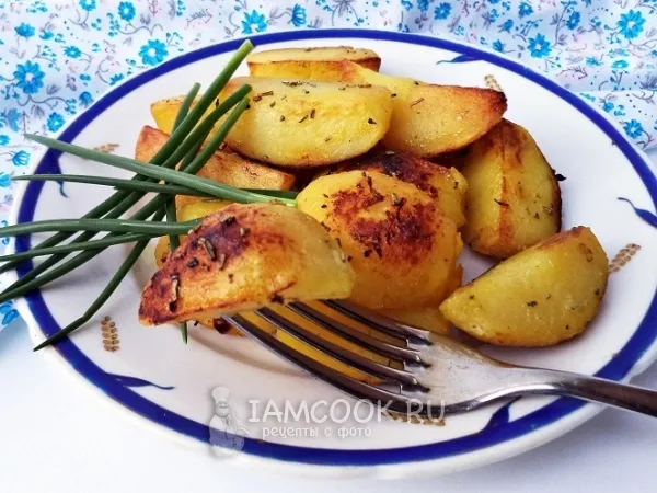 Фото готового блюда: Ароматный картофель с розмарином и апельсином