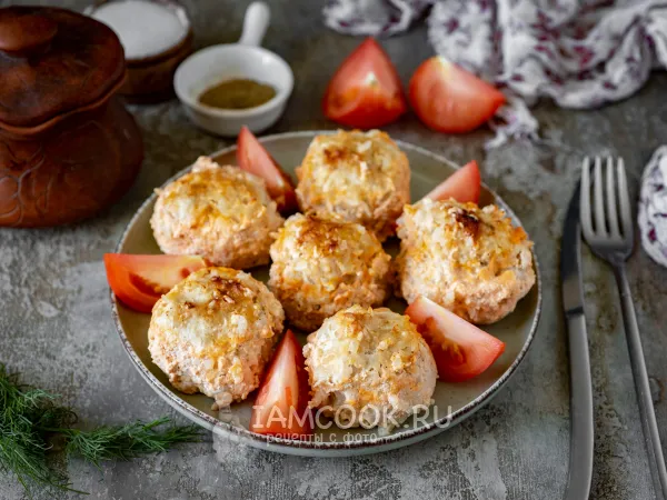 Фото готового блюда: Ежики из индейки с рисом в духовке