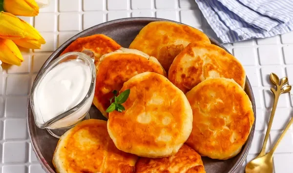 Фото блюда: Сырники с манкой в мультиварке