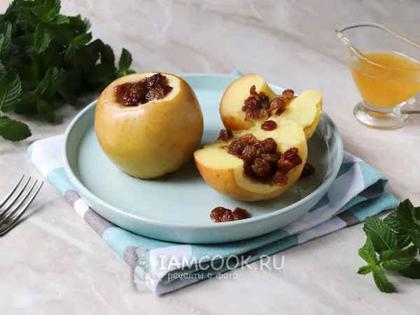 Фото готового блюда: Яблоки с изюмом и мёдом, запеченные в духовке