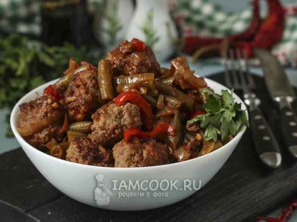 Фото готового блюда: Фрикадельки с овощами в кисло-сладком соусе