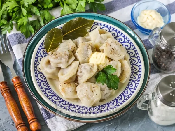 Фото готового блюда: Пельмени в мультиварке