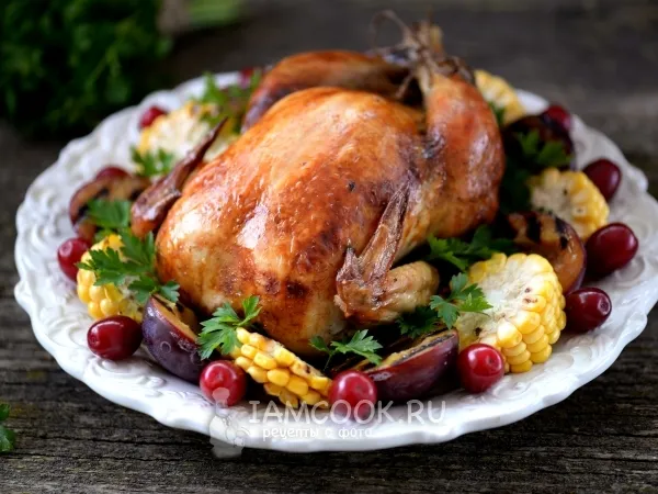 Фото готового блюда: Курица, фаршированная картошкой, в духовке