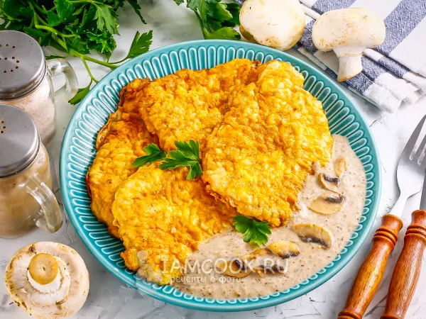 Фото блюда: Свиные отбивные с грибным соусом