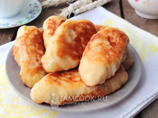 Фото готового блюда: Пирожки с квашеной и свежей капустой