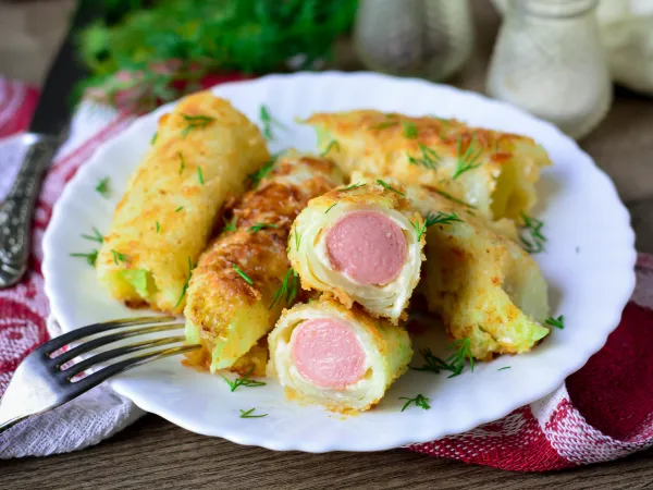 Фото блюда: Сосиски в капусте