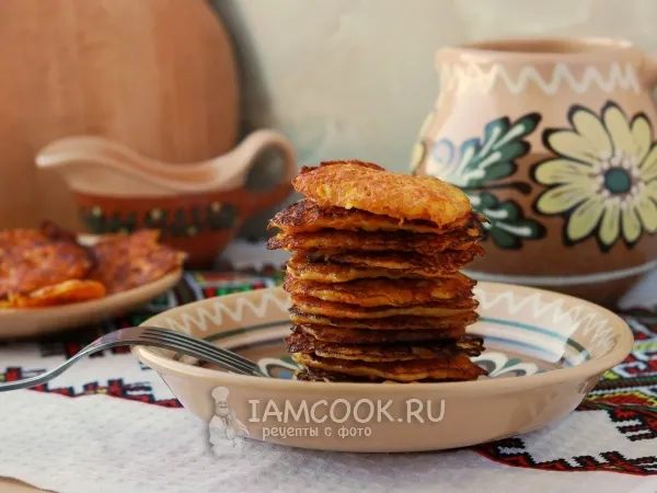 Фото готового блюда: Морковные оладьи с манкой