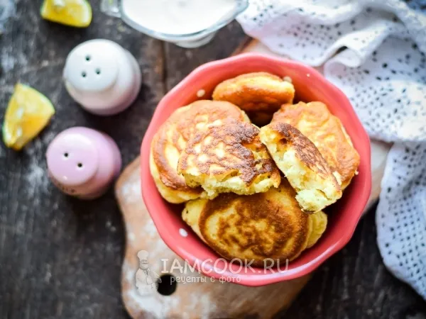 Фото готового блюда: Пышные оладьи с манкой на кефире