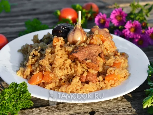 Фото блюда: Плов из свинины в казане на костре