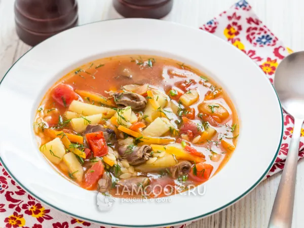 Фото готового блюда: Томатный суп с куриными сердечками