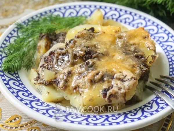 Фото готового блюда: Картошка с грибным фаршем в духовке