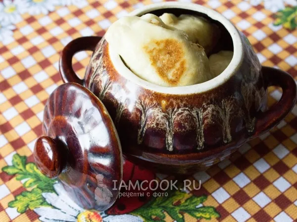 Фото готового блюда: Золотистые вареники с капустой