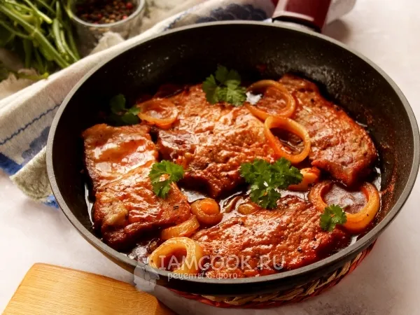 Фото готового блюда: Тушеные отбивные из свинины