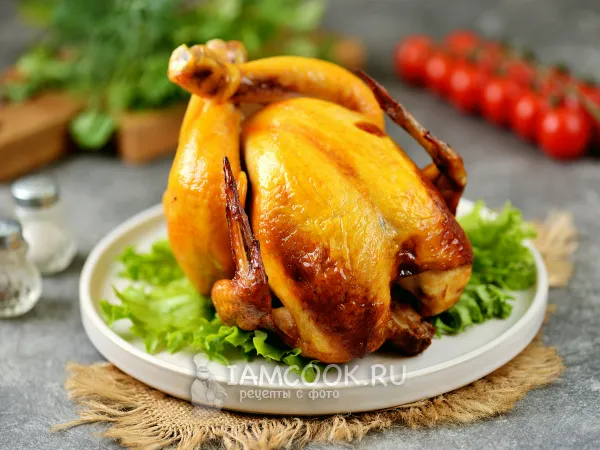 Фото готового блюда: Курица на банке с пивом в духовке