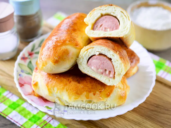 Фото готового блюда: Сардельки в тесте в духовке