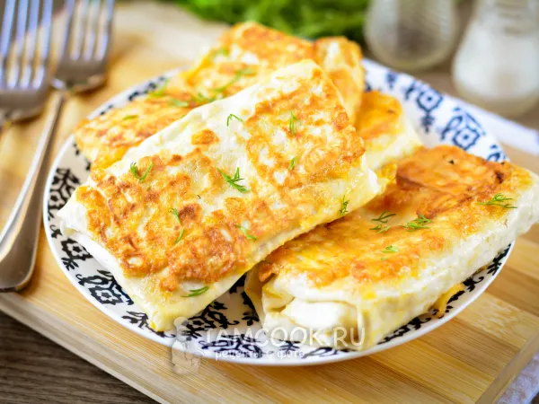 Фото готового блюда: Конвертики из лаваша с картошкой