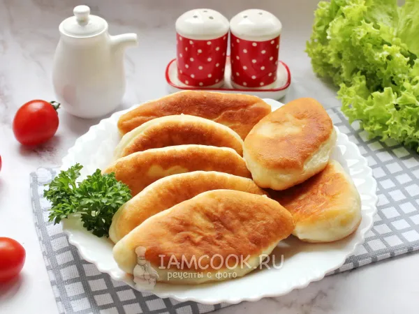 Фото готового блюда: Жареные пирожки с капустой и рыбой