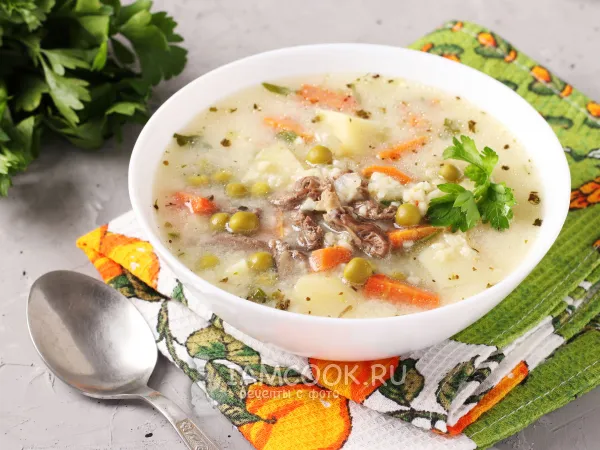 Фото готового блюда: Сырный суп с куриными сердечками