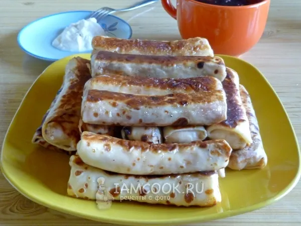 Фото готового блюда: Блины с творогом, обжаренные на сливочном масле