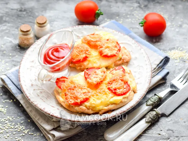 Фото блюда: Куриные отбивные с ананасом, помидором и сыром в духовке