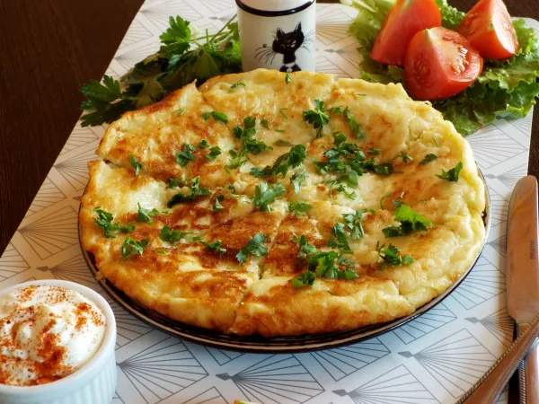 Фото блюда: Кабачковая лепешка с сыром на сковороде