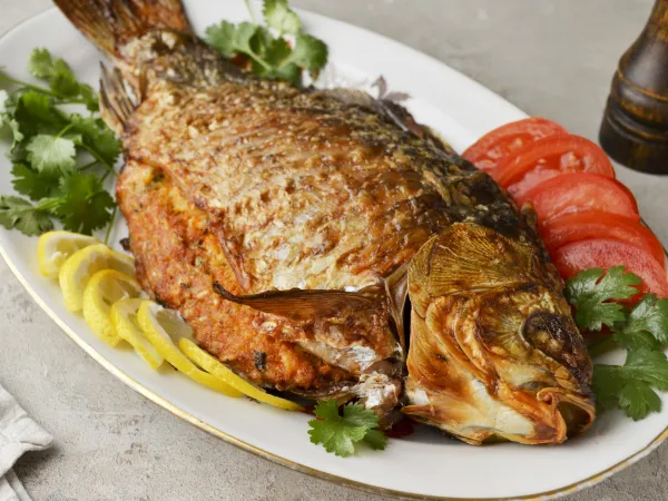 Фото блюда: Карась, фаршированный рисом, в духовке