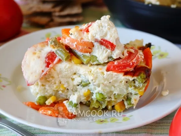 Фото готового блюда: Омлет с овощами в духовке