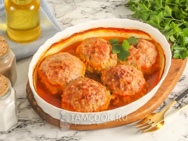 Фото готового блюда: Ежики из фарша в духовке с подливкой