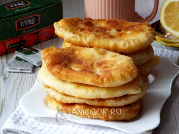 Фото готового блюда: Тонкие пирожки с картошкой на кефире