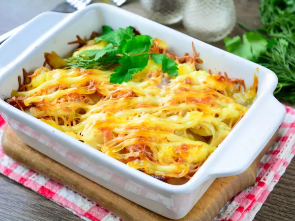 Фото готового блюда: Картошка по-французски с беконом в духовке