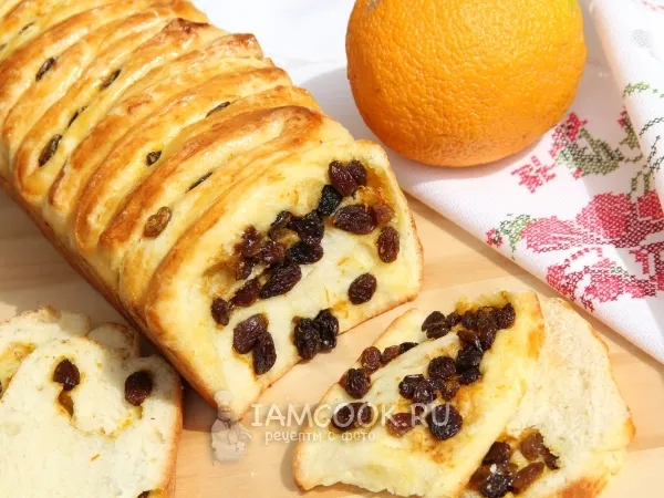 Фото готового блюда: Апельсиновый пирог с изюмом