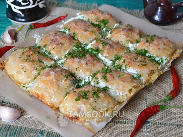 Фото готового блюда: Рыбные тефтели из консервов горбуши и риса в духовке