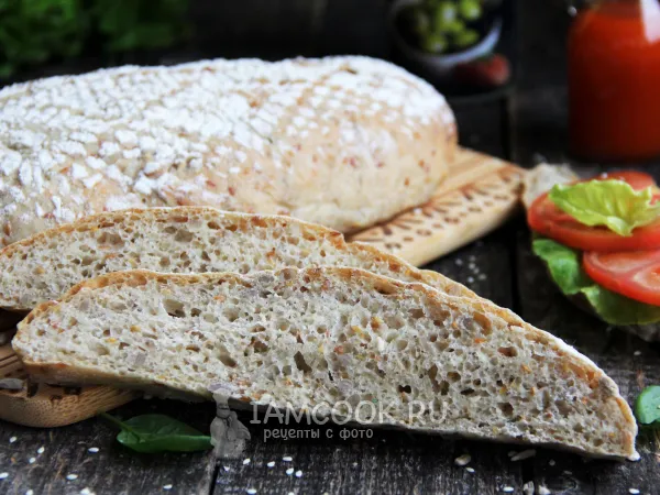 Фото готового блюда: Хлеб «Три семечки» на дрожжах в духовке