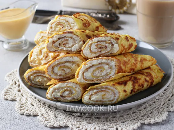Фото готового блюда: Блины с творогом и сгущёнкой