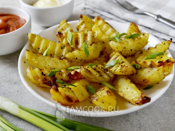 Фото готового блюда: Картошка по-деревенски без кожуры в духовке