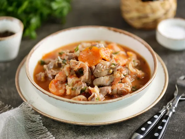 Фото готового блюда: Куриные желудки с помидорами (тушеные)