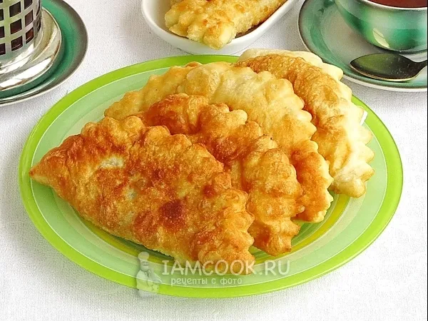 Фото готового блюда: Пирожки жареные с опятами