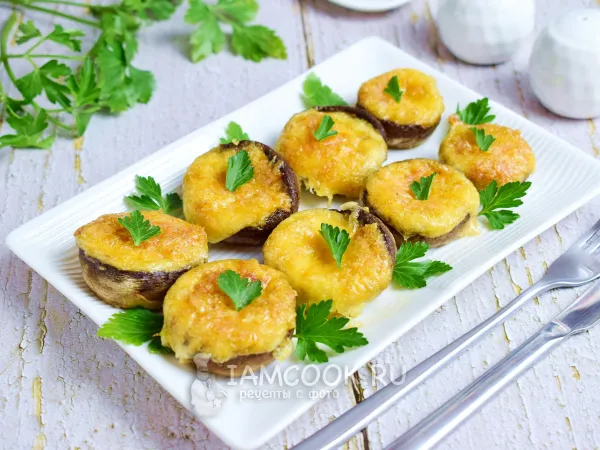 Фото готового блюда: Шампиньоны с сыром в духовке