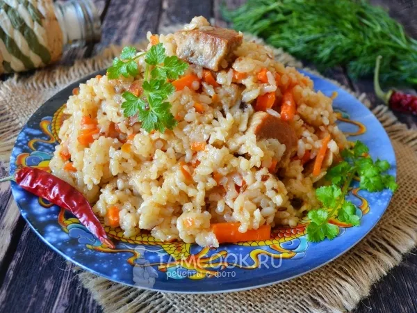 Фото блюда: Плов из свинины в казане на плите (классический рецепт)