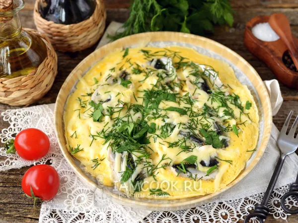 Фото готового блюда: Омлет с килькой на сковороде