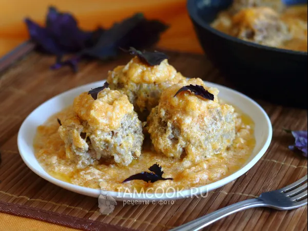 Фото готового блюда: Тефтели в тыквенном соусе