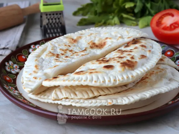 Фото готового блюда: Янтык с сыром и помидорами