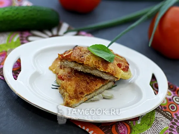 Фото блюда: Отбивные из свинины с помидорами и сыром в духовке