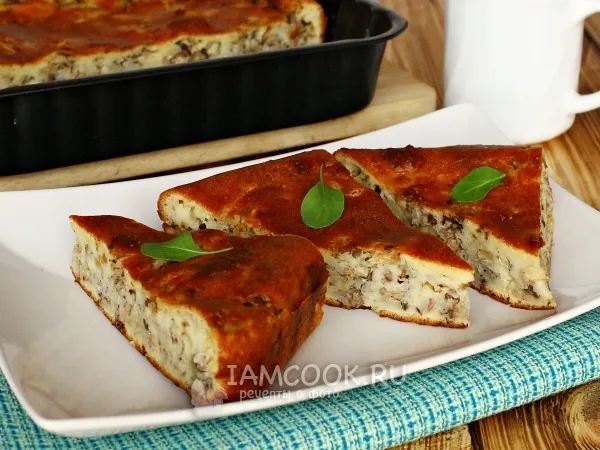 Фото готового блюда: Заливной пирог с сайрой и рисом