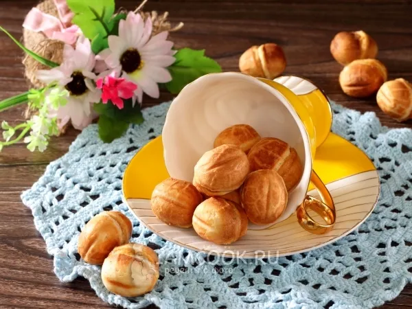 Фото готового блюда: Печенье орешки со сгущенкой