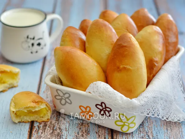 Фото готового блюда: Печёные пирожки с картошкой